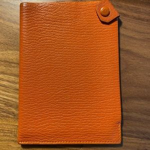 Authentic Hermès orange Tarmac Passport snap cover